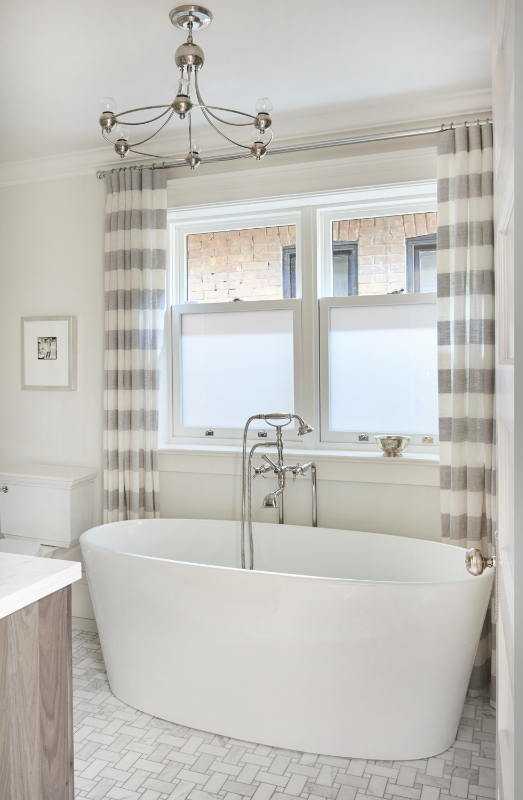 Beautiful Vinyl single hung window in this bathroom oasis. Be sure to go to www